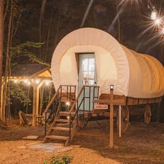 Old Copper luxury glamping wagon by the Ocoee